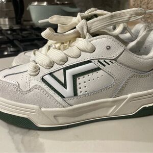 Vans White Sneakers with Green Logo